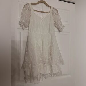 White dress with floral lace details